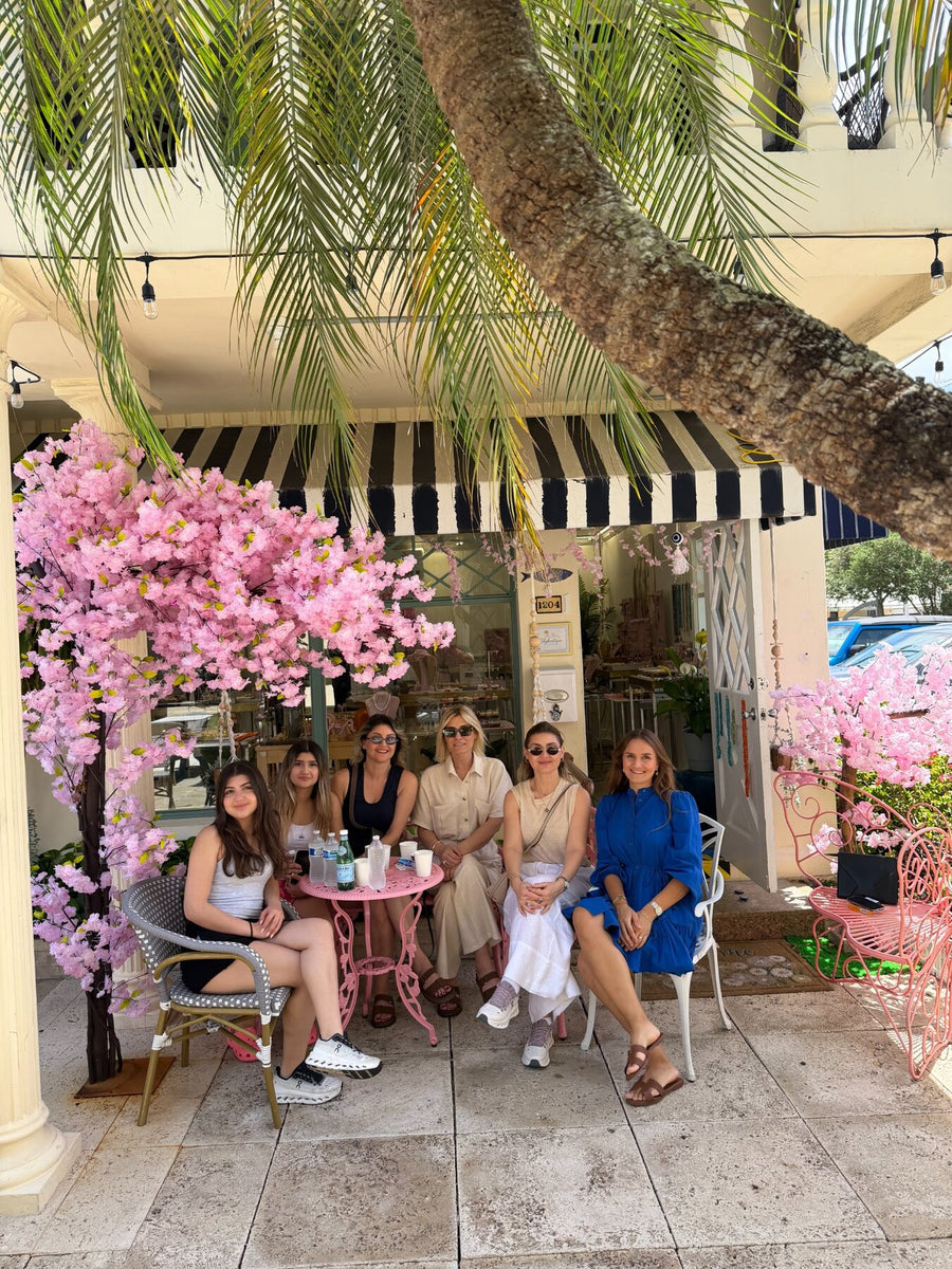 Friends gathering at Sky Boutique Florida in Delray Beach