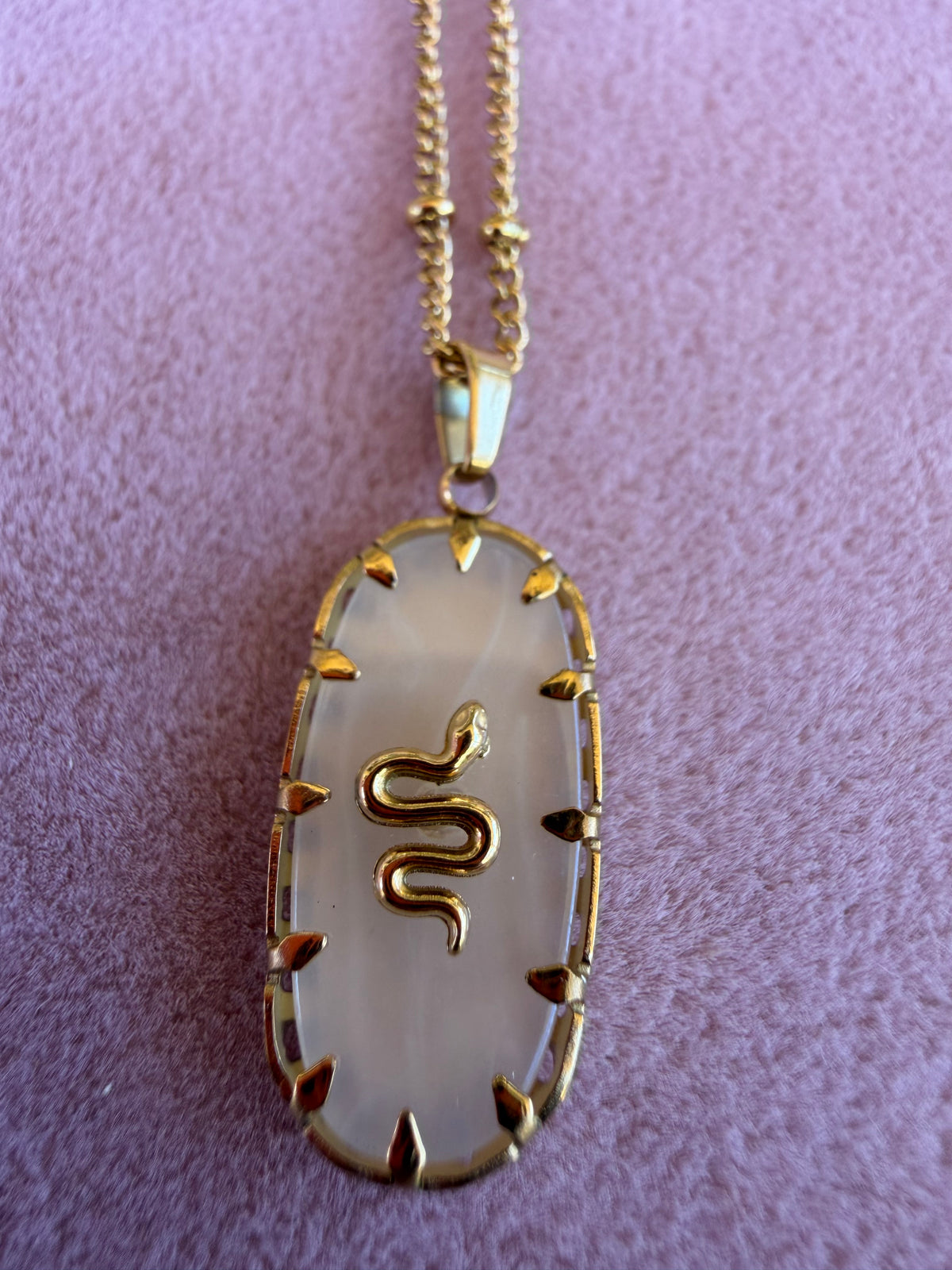 Gold Oval Open Frame Serpent Pendant Necklace