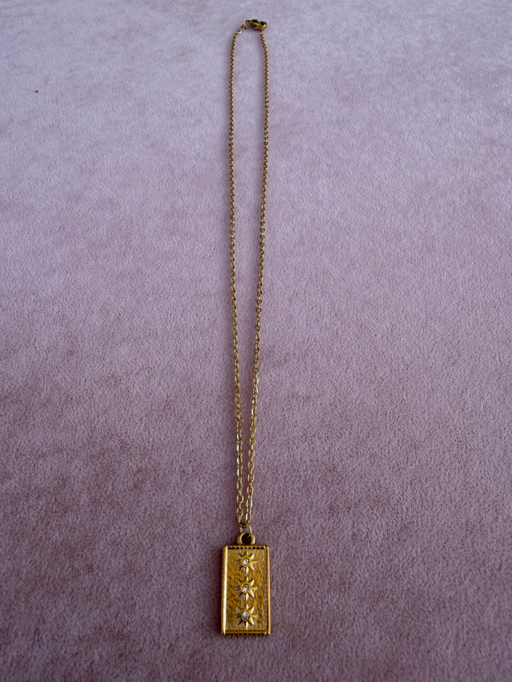 Gold Rectangular Pendant Necklace with Triple North Star Crystal Design