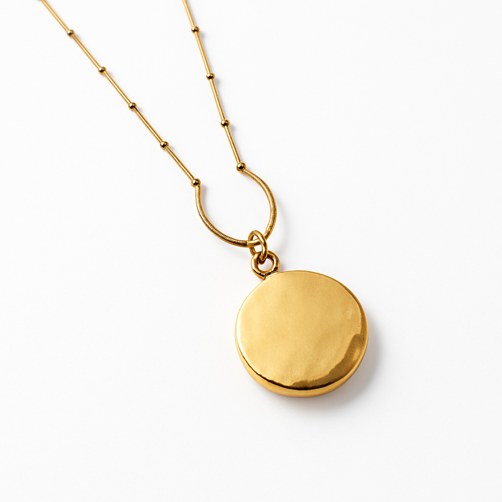 Gold Sunburst Disc Pendant Necklace with Green Stone Center